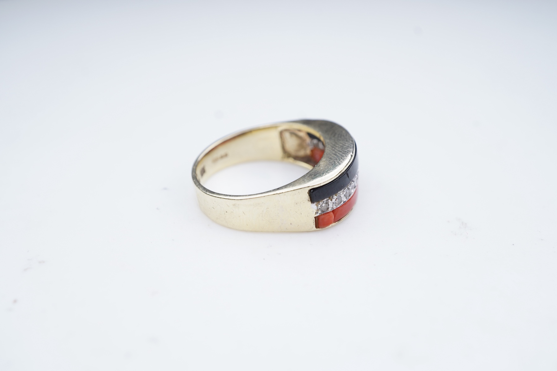 An onyx, coral and diamond demi-parure, circa 1976-7